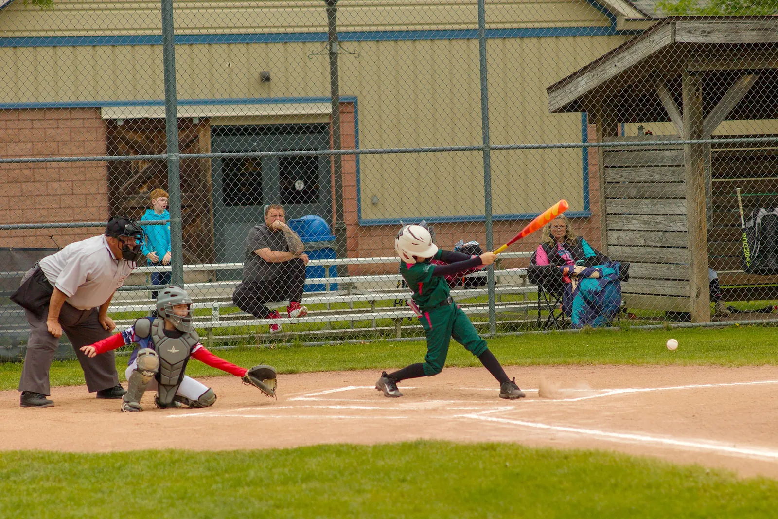A Rizzlers batter swings at a pitch