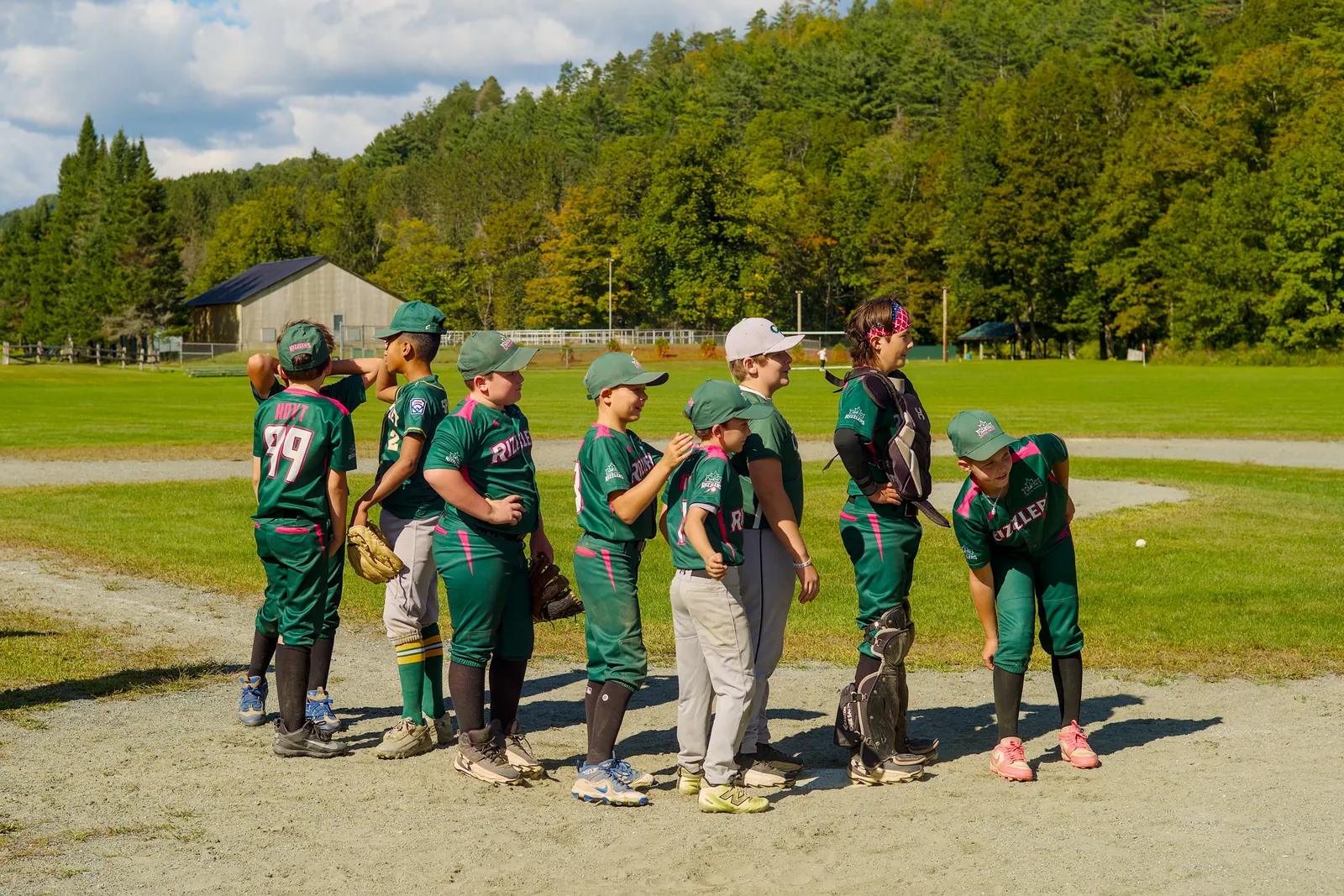 The Rizzlers huddle on the field